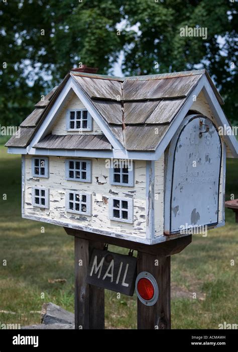 Mailbox in the shape of a small house Stock Photo - Alamy