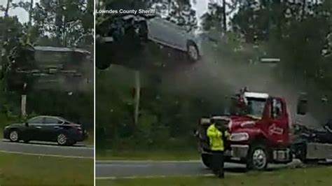 VIDEO: Car flies airborne off back of tow truck in shocking Georgia ...