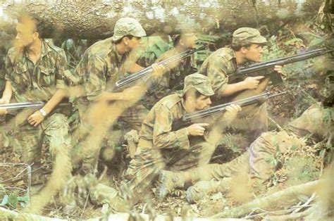 A Portuguese patrol return fire during the Portuguese Colonial War, circa early 1970's.[713x413 ...