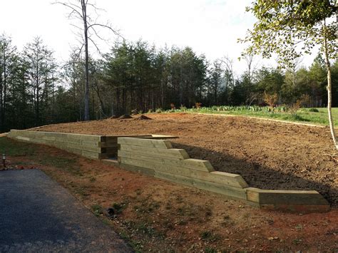 This retaining wall utilizes 6x6 posts with a center indention for ...