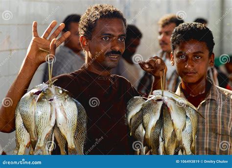 Yemeni Fisherman Demonstrates Catch of the Day at the Fish Market in Al ...