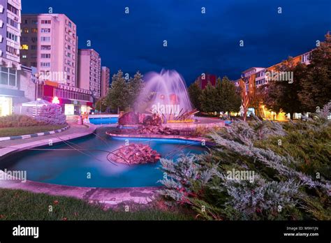 Photography of night light of center of Pitesti in Romanian Stock Photo - Alamy