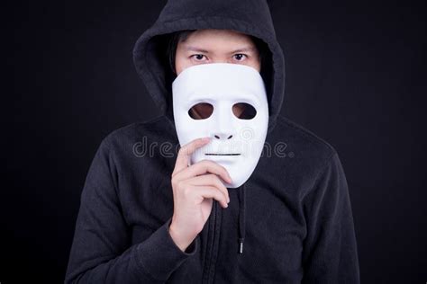 Mystery Man Holding White Mask for Hide His Face Stock Image - Image of ...