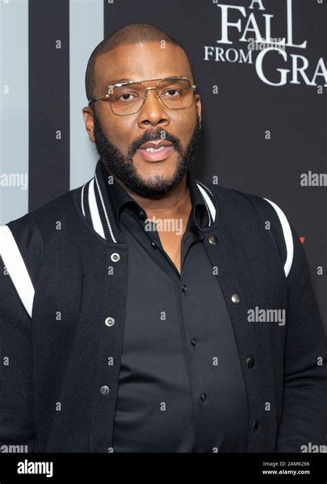 New York, NY - January 13, 2020: Tyler Perry wearing dress by Givenchy attends premiere of ...