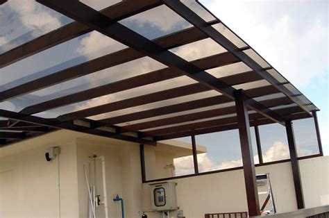 Polycarbonate patio or deck roof. Let's light in, protects from rain ...