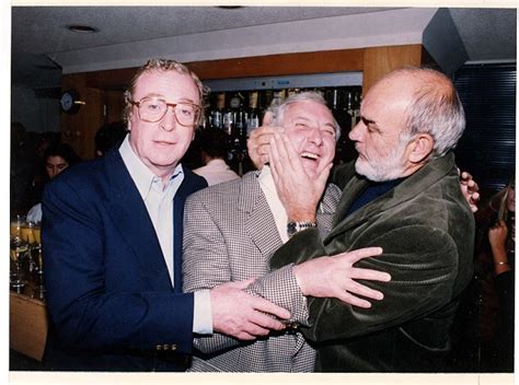 Michael Caine and Sean Connery clown with the late director Michael Winner.