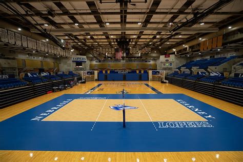 PHOTO GALLERY: Loper Volleyball installs new Taraflex court – UNK News