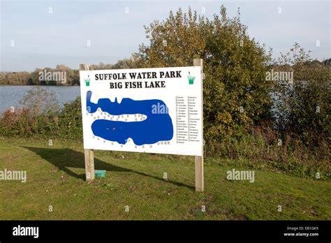 Sign showing map of Big Fish lake at Suffolk water park, Bramford, Suffolk, England, UK Stock ...