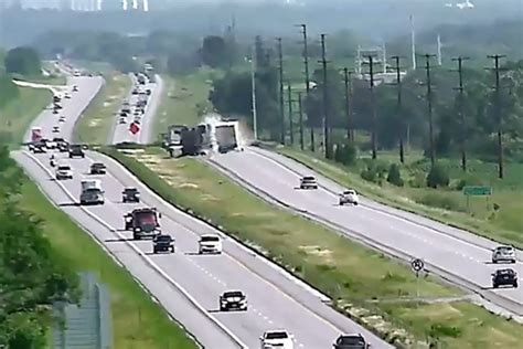 Stranded truck driver runs for his life in two truck "move over" crash caught on Iowa DOT ...