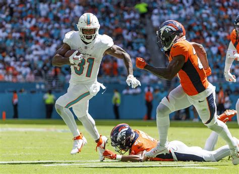 Dolphins Demolish Broncos 70-20; Achieving Highest NFL Game Score in 57 Years - Sports Al Dente