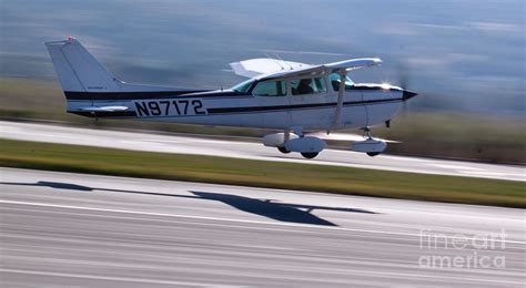 Cessna Takeoff Photograph by John Daly