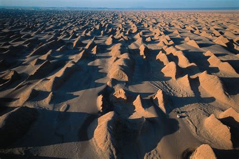 Yardang field of the Dasht-e Lut. This is the largest field of wind-eroded rocks (yardangs) in ...