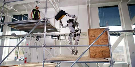 boston dynamics' humanoid robot 'atlas' effortlessly helps on ...