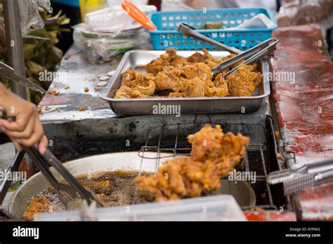 Fried chicken on a street food stall,Cebu City,Philippines Stock Photo ...