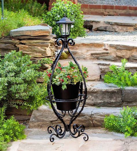 Black Wrought Iron Plant Stand with Solar Light | Night Garden | Collections | Wind and Weather
