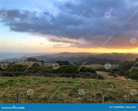 Sunset Over Rolling Hills in Country Stock Photo - Image of mountain ...