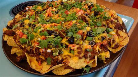 Nachos Supreme: Tortilla Chips; Refried Beans; Ground Beef, cooked and drained; Taco Seasoning ...