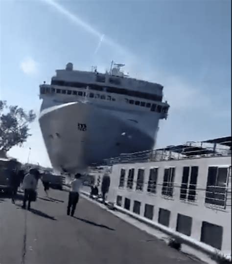 Cruise Ship Slams Into Dock As Tourists Flee [VIDEO]