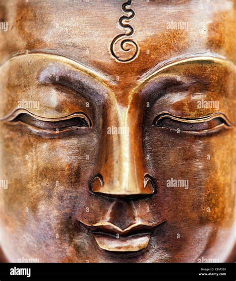 Buddha face statue Stock Photo - Alamy