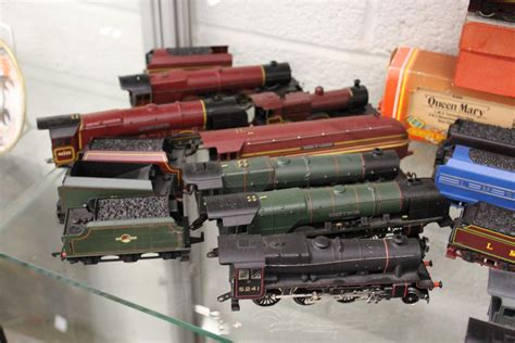 A collection of Hornby double OO gauge trains and carriages.