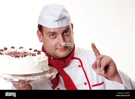 Pastry chef holding a Black Forest Cake Stock Photo - Alamy