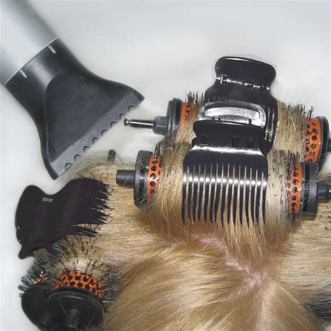 Body Up Pro Hair Brush System from i-glamour.com...It’s as easy as pushing a button!