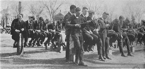 File:Dartmouth College campus - students carving canes on the Senior Fence.jpg - Wikimedia Commons
