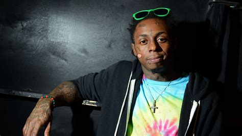 Lil Wayne hospitalized after seizures; condition unclear