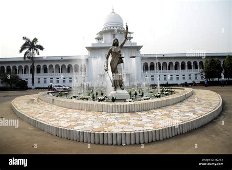 A Lady Justice statue stands in front of the Supreme Court complex in ...