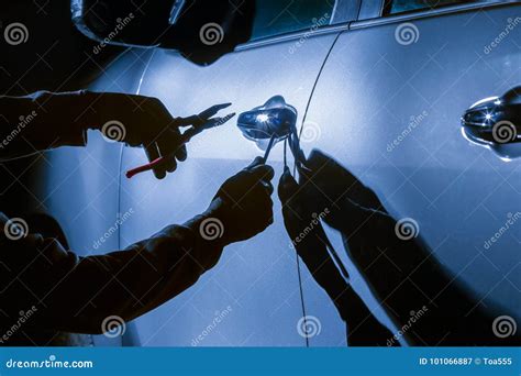 Car Thief Using a Tool To Break into a Car Stock Image - Image of mafia, street: 101066887