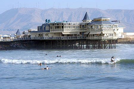 Surfing in Miraflores. Always have surfers out close to La Rosa Nautica ...