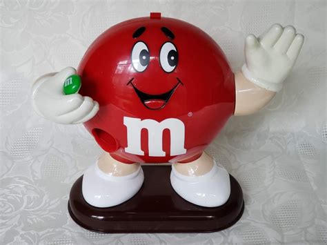 Red M&M Candy Dispenser with Waving Hand – SOLD – Aunt Gladys' Attic