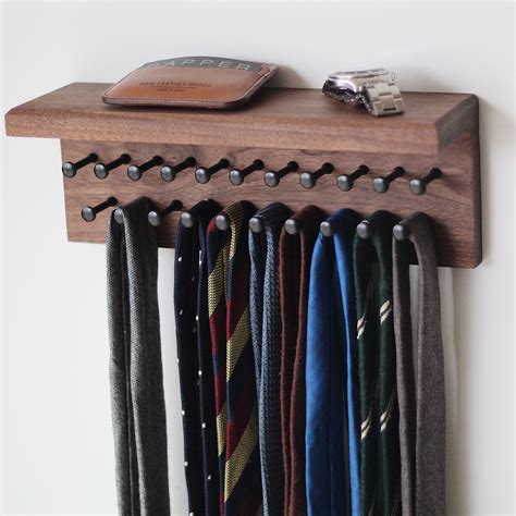 Custom walnut tie rack with black pegs and shelf. Handcrafted in Dallas in Dallas, Tx by Dapper ...