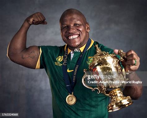 Mbongeni Mbonambi of South Africa poses with the Webb Ellis Cup... News Photo - Getty Images