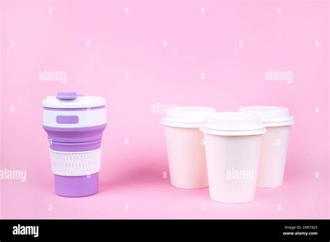 Reusable coffee cup vs disposable cups Stock Photo - Alamy