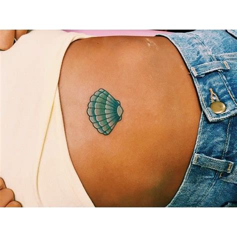 “Seashell for jesica's first tattoo! ” | Mermaid tattoos, Shell tattoos, Seashell tattoos