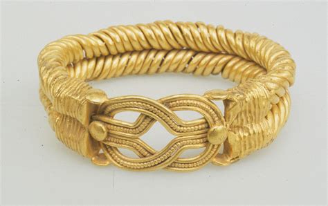 Bracelet with spirally twisted strands and a Herakles knot at the bezel | Roman Period | The ...