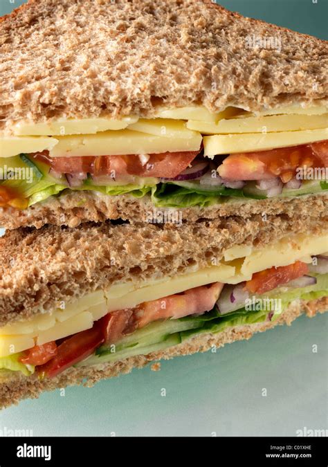 Cheese sandwich with tomato lettuce cucumber Stock Photo - Alamy