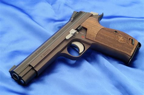 Weapons: Sig P210-2 chambered in 9mm