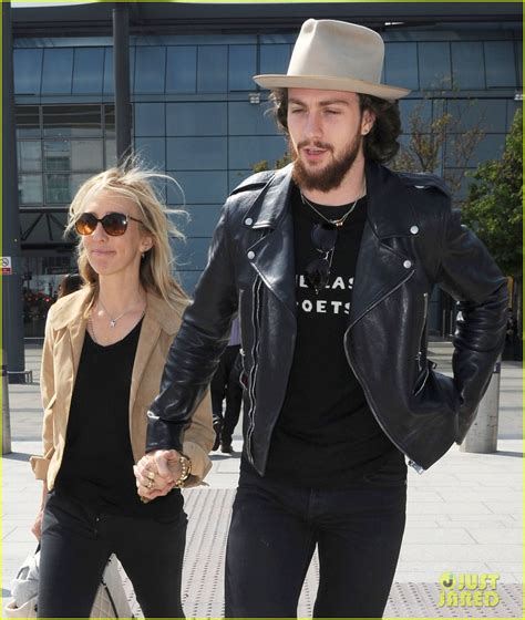 Elizabeth Olsen & Aaron Taylor-Johnson Arrive in London for 'Avengers ...