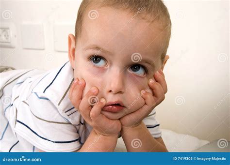 Child In Thinking Pose Royalty Free Stock Photo - Image: 7419305