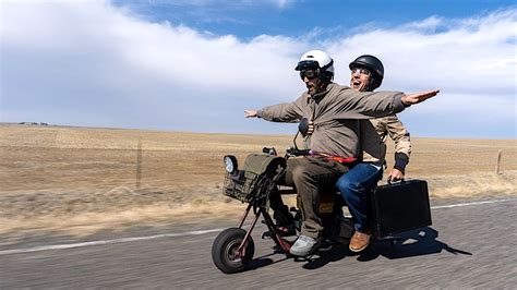 Motorcycle Enthusiasts Hilariously Recreate the Iconic Mini Bike Road Trip From the Film 'Dumb ...