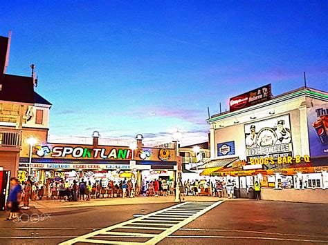 View of the boardwalk from the pier | Ocean city maryland, Ocean city ...