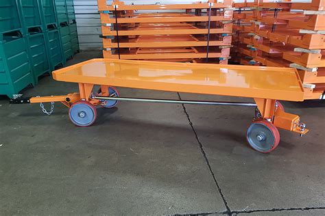 Heavy-Duty Quad Steer Tow Carts | Tugger Carts - Warehouse Rack and Shelf