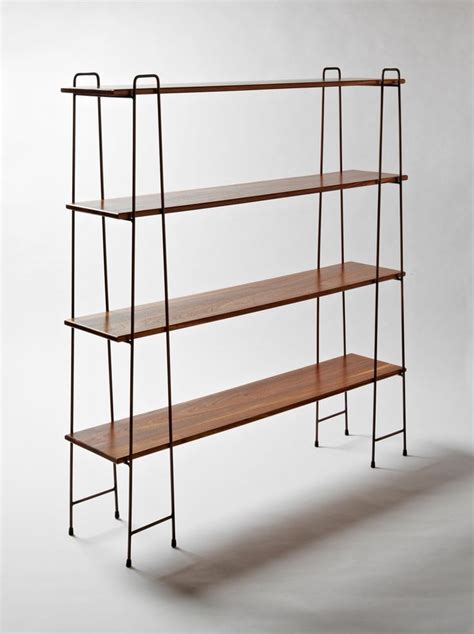 A free standing shelving unit achieves a minimal look, which is honest to its materials and u ...