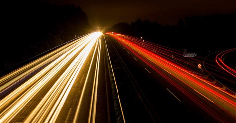 Speeding Car on High Way during Night Time · Free Stock Photo