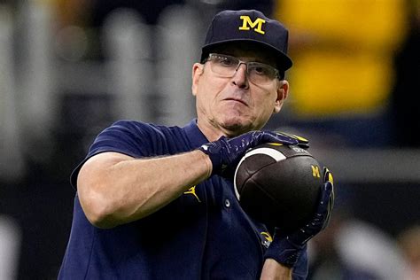 Watch Michigan’s Jim Harbaugh get surprise hug from brother John in ...