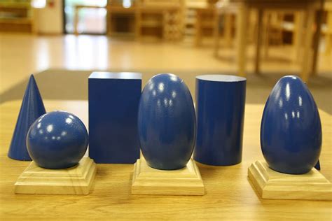several, blue, vases, wooden, table, geometric solids, montessori, shapes, geometric shapes ...
