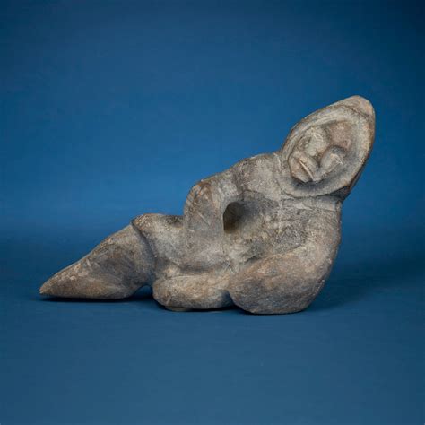 Lot - Paul Toolooktook (1947-2003, Inuit; Baker Lake/Qamani’tuaq), Carved lounging figure