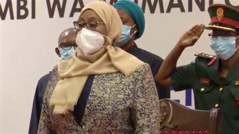 Tanzania's president wears her face mask at home